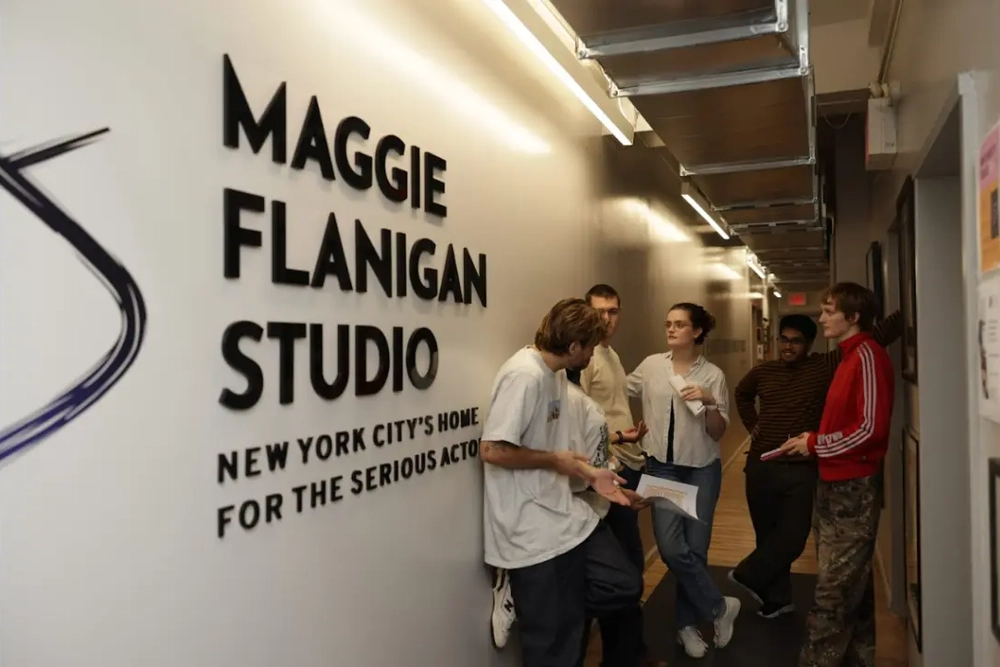 Maggie Flanigan Studio's name printed on the wall.