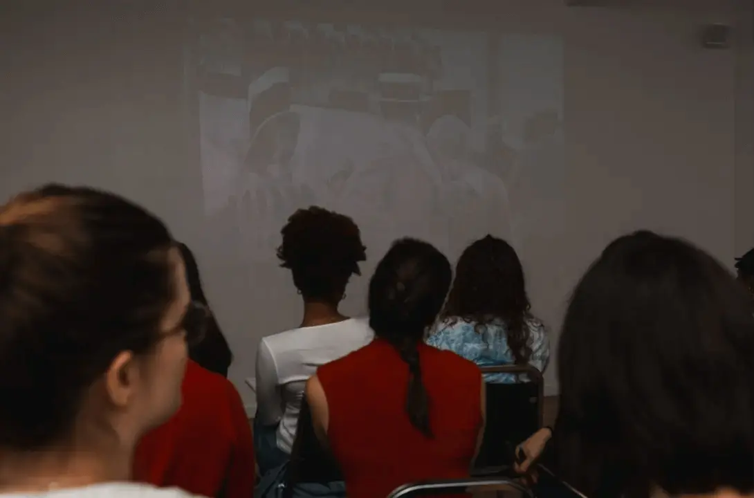 Maggie Flanigan Studio students watching a film