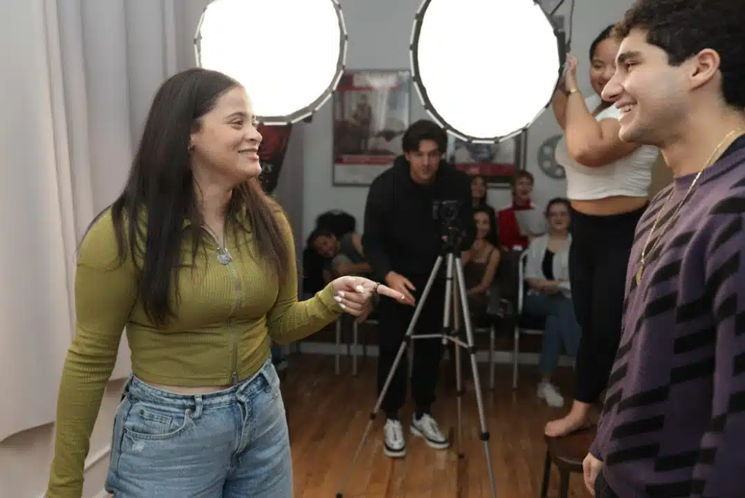 Actors acting in front of a camera.