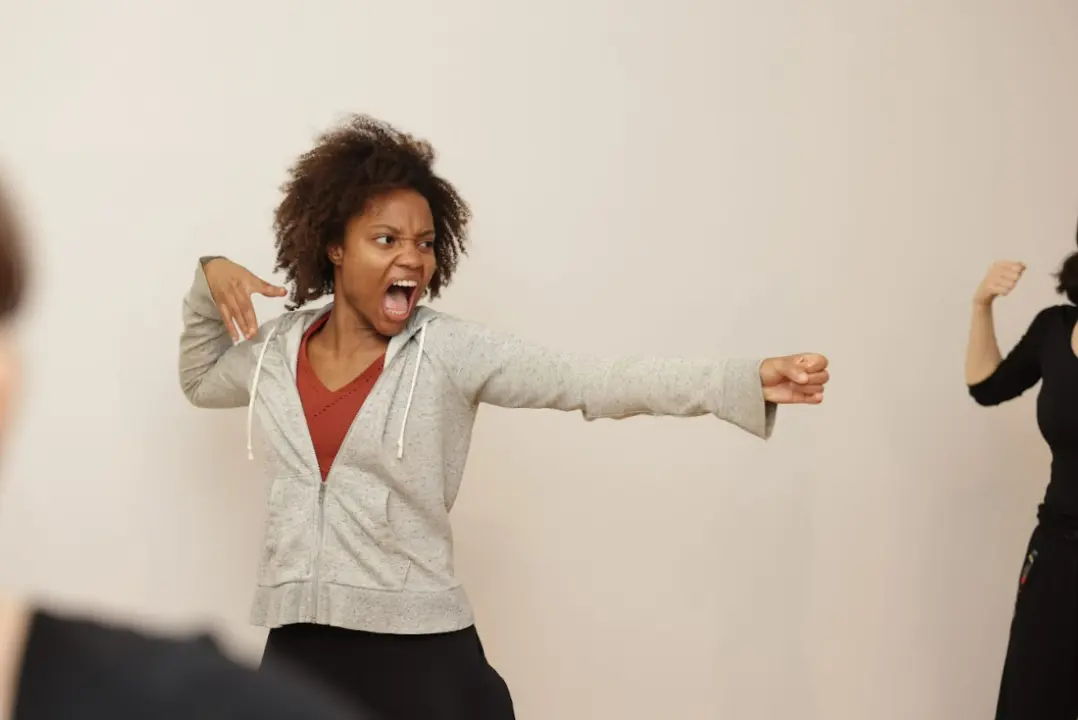 An actor taking movement classes