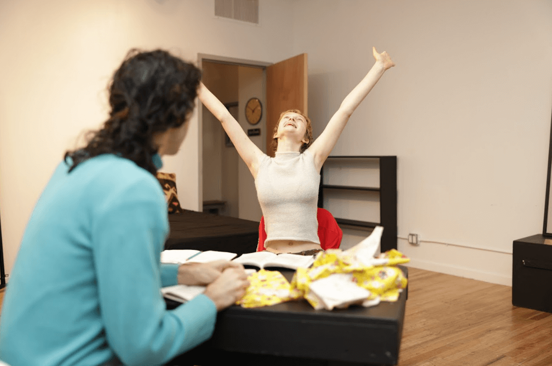 Actors engaged in a Meisner exercise.